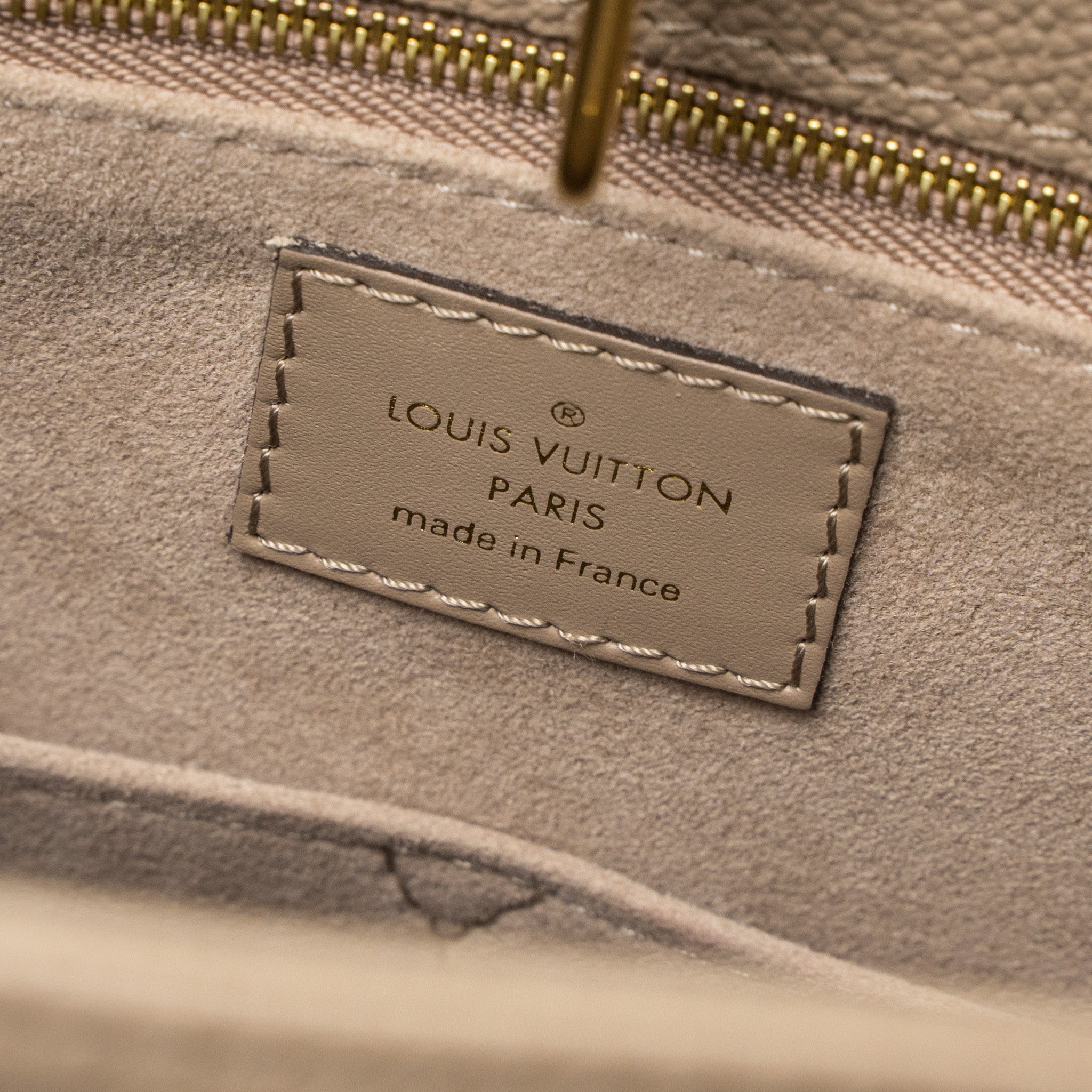LOUIS VUITTON ON THE GO MM MONOGRAM EMPREINTE TOURTERELLE GHW
