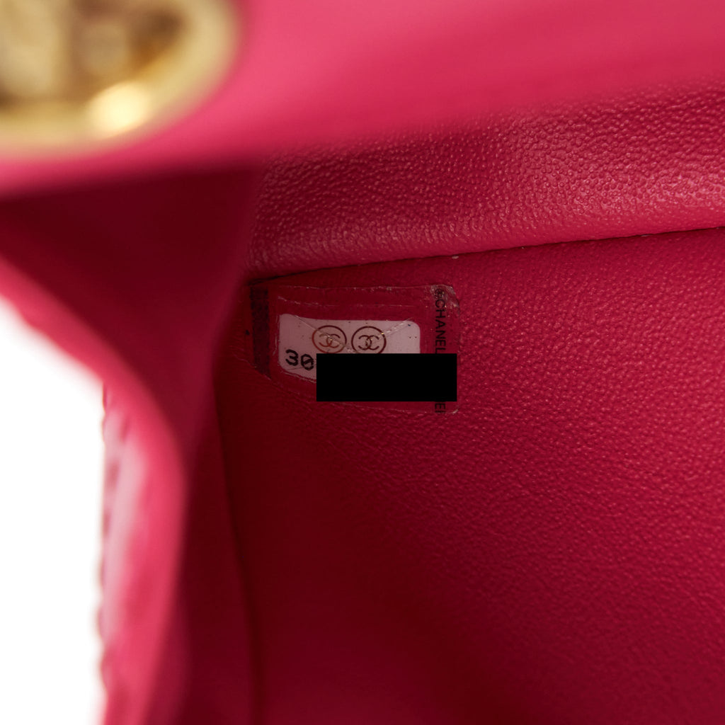CHANEL MINI 2.55 REISSUE FLAP BAG AGED CALFSKIN HOT PINK GHW