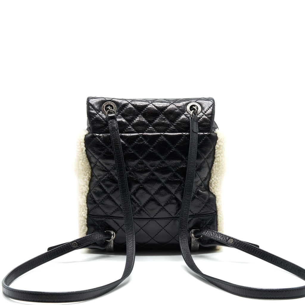 CHANEL MOUNTAIN SMALL BACKPACK SHEARLING WITH QUILTED CALFSKIN RUTHENIUM HARDWARE