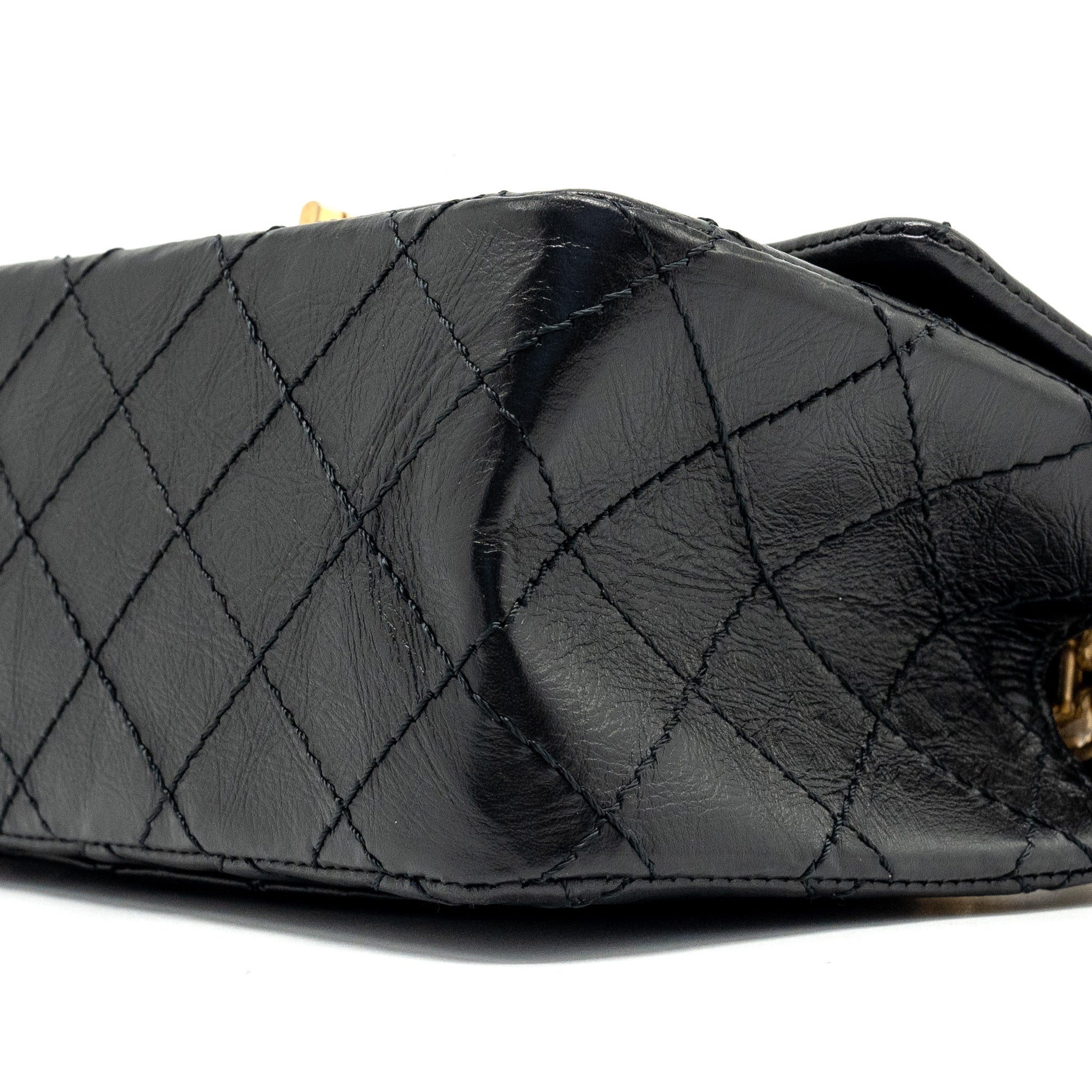 CHANEL MINI 2.55 REISSUE FLAP BAG AGED CALFSKIN BLACK GHW