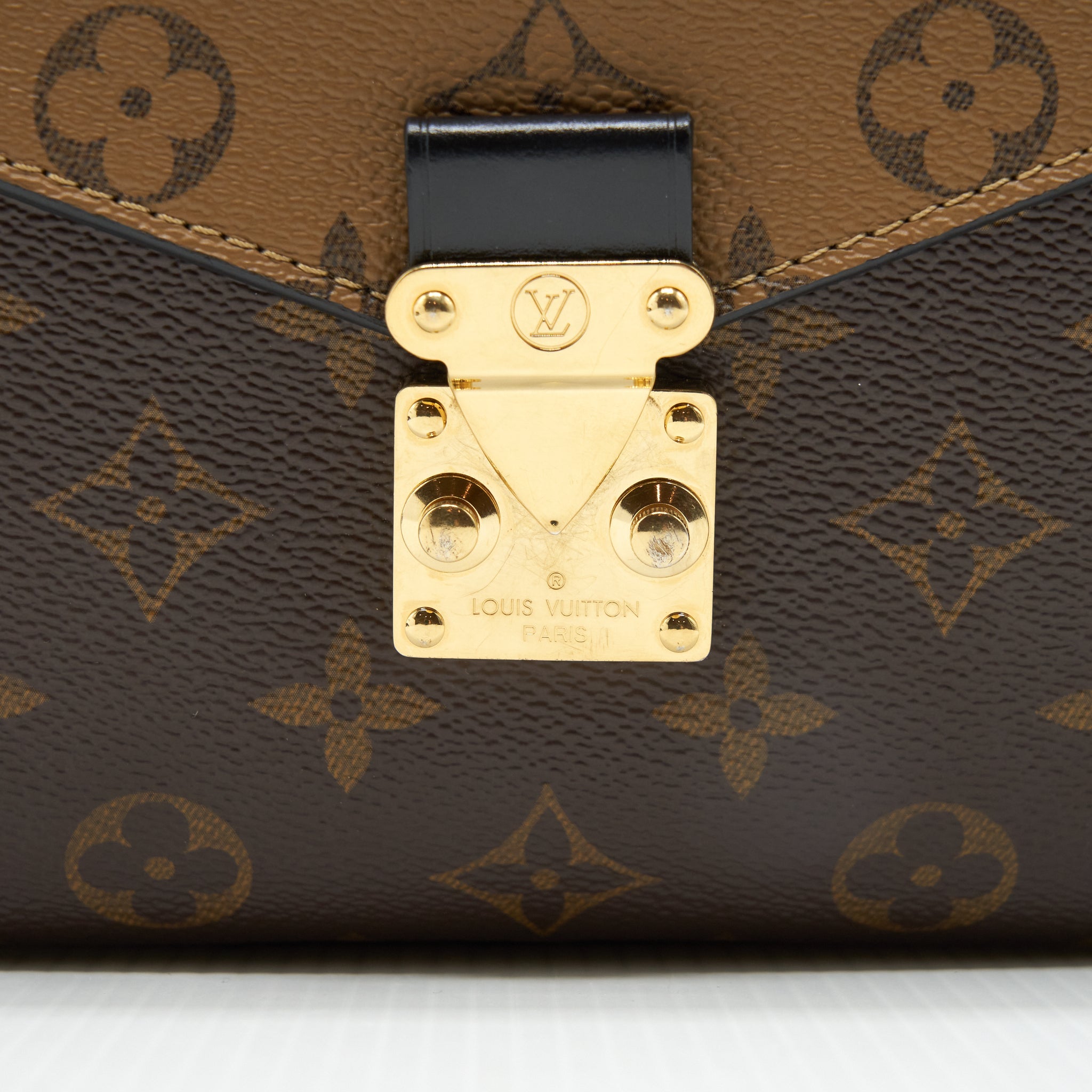 LOUIS VUITTON POCHETTE MÉTIS REVERSE MONOGRAM CANVAS GHW