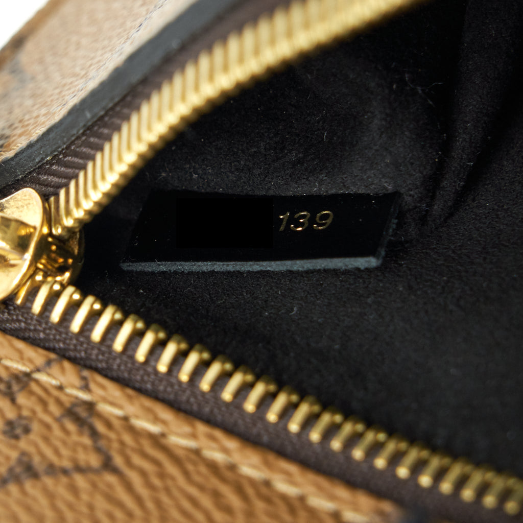 LOUIS VUITTON POCHETTE MÉTIS REVERSE MONOGRAM CANVAS GHW