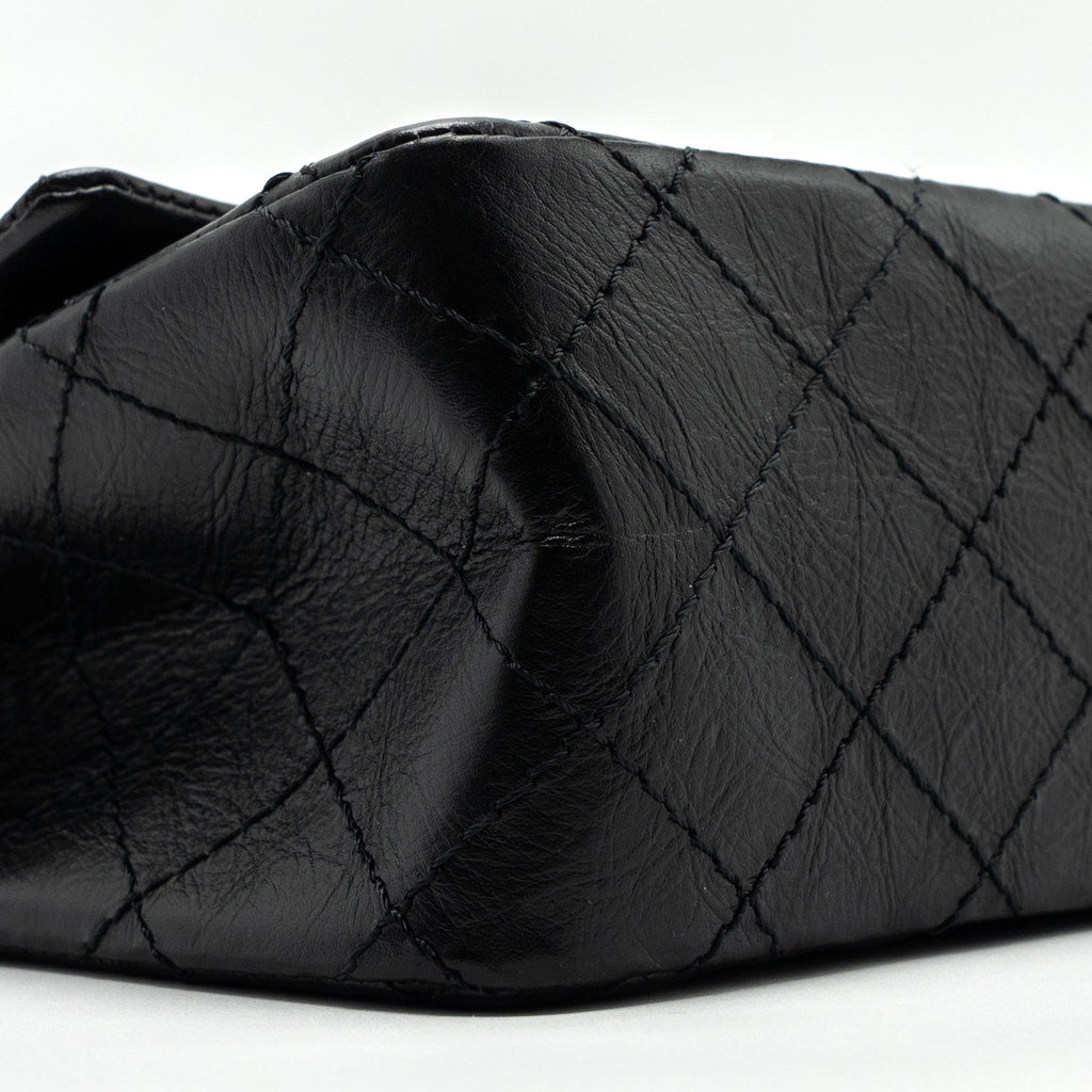 CHANEL MINI 2.55 REISSUE FLAP BAG AGED CALFSKIN BLACK GHW