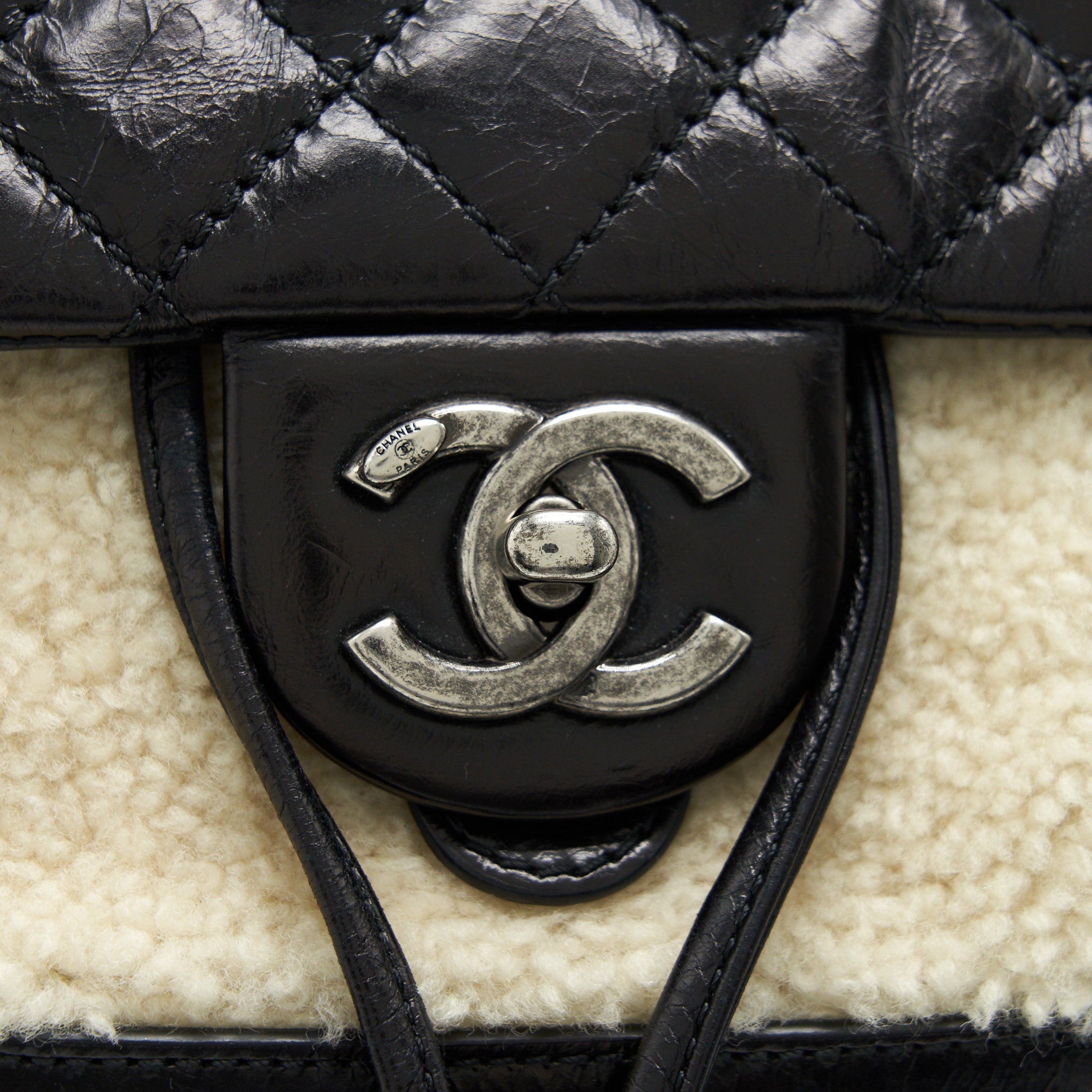CHANEL MOUNTAIN SMALL BACKPACK SHEARLING WITH QUILTED CALFSKIN RUTHENIUM HARDWARE