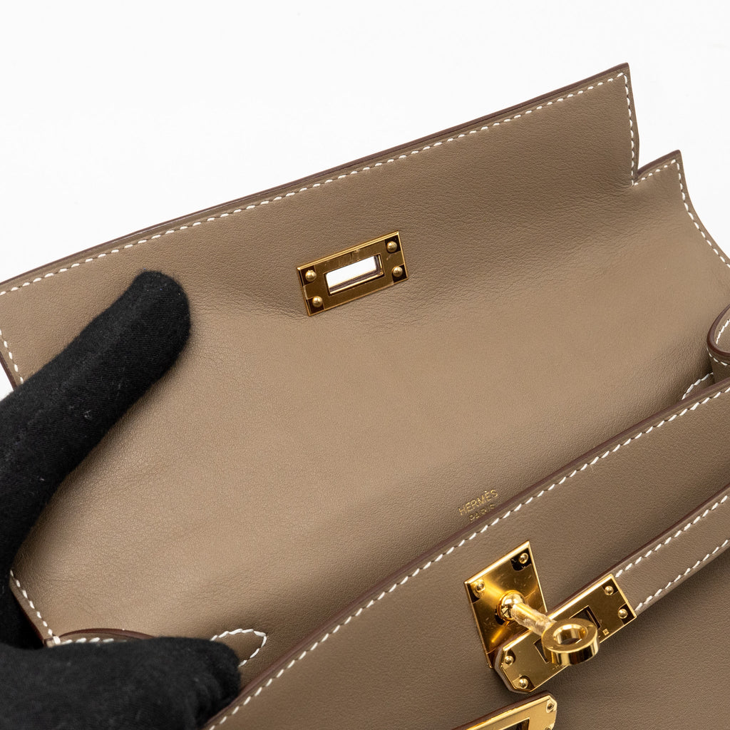 HERMES KELLY POCHETTE SWIFT ETOUPE GHW