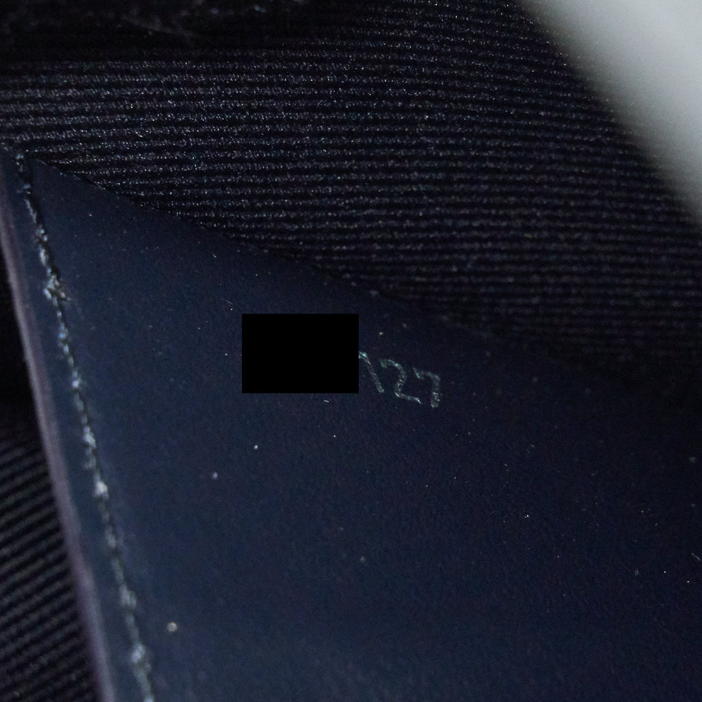 LOUIS VUITTON CHAPMAN POCHETTE VOYAGE GM