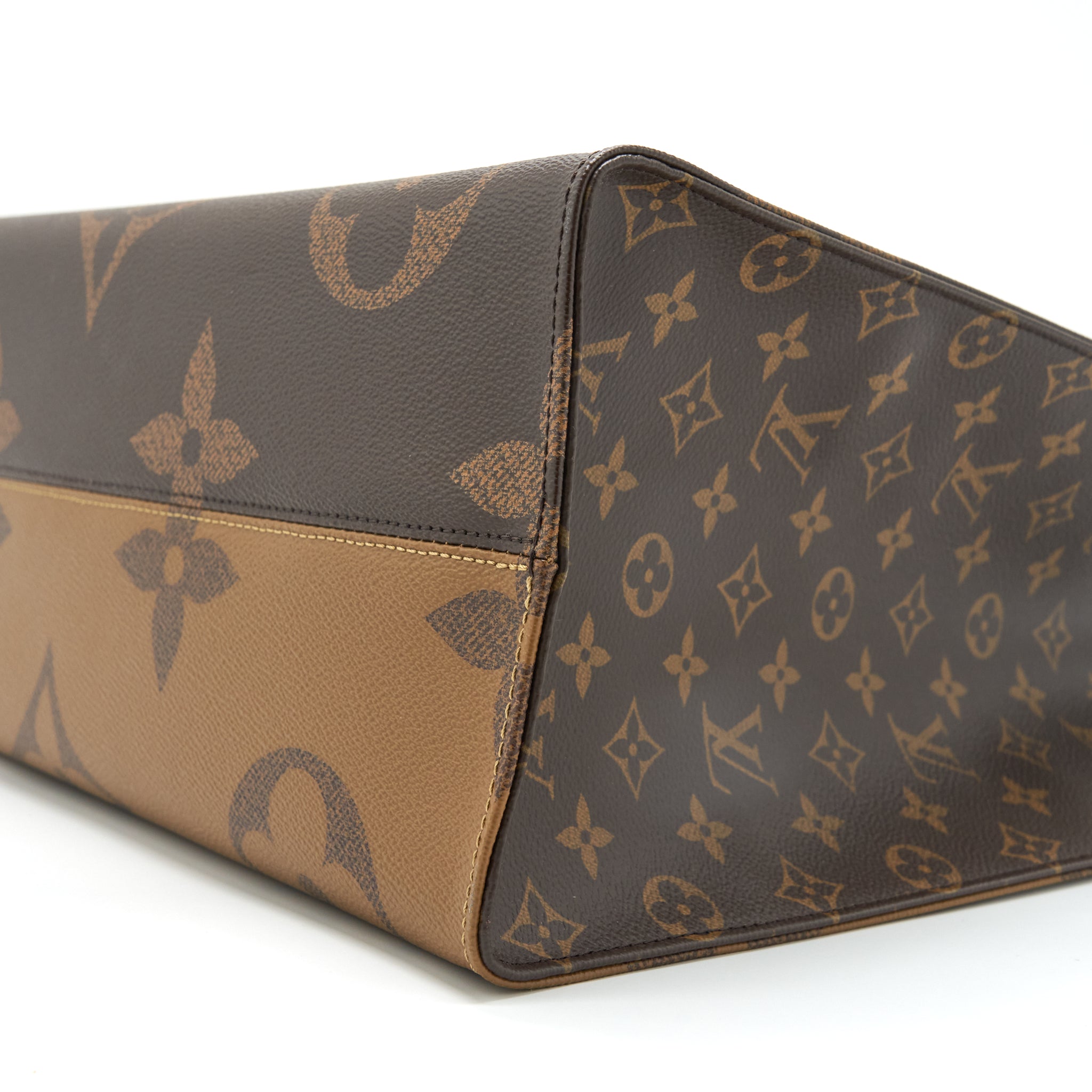 LOUIS VUITTON ON THE GO GM MONOGRAM REVERSE CANVAS GHW