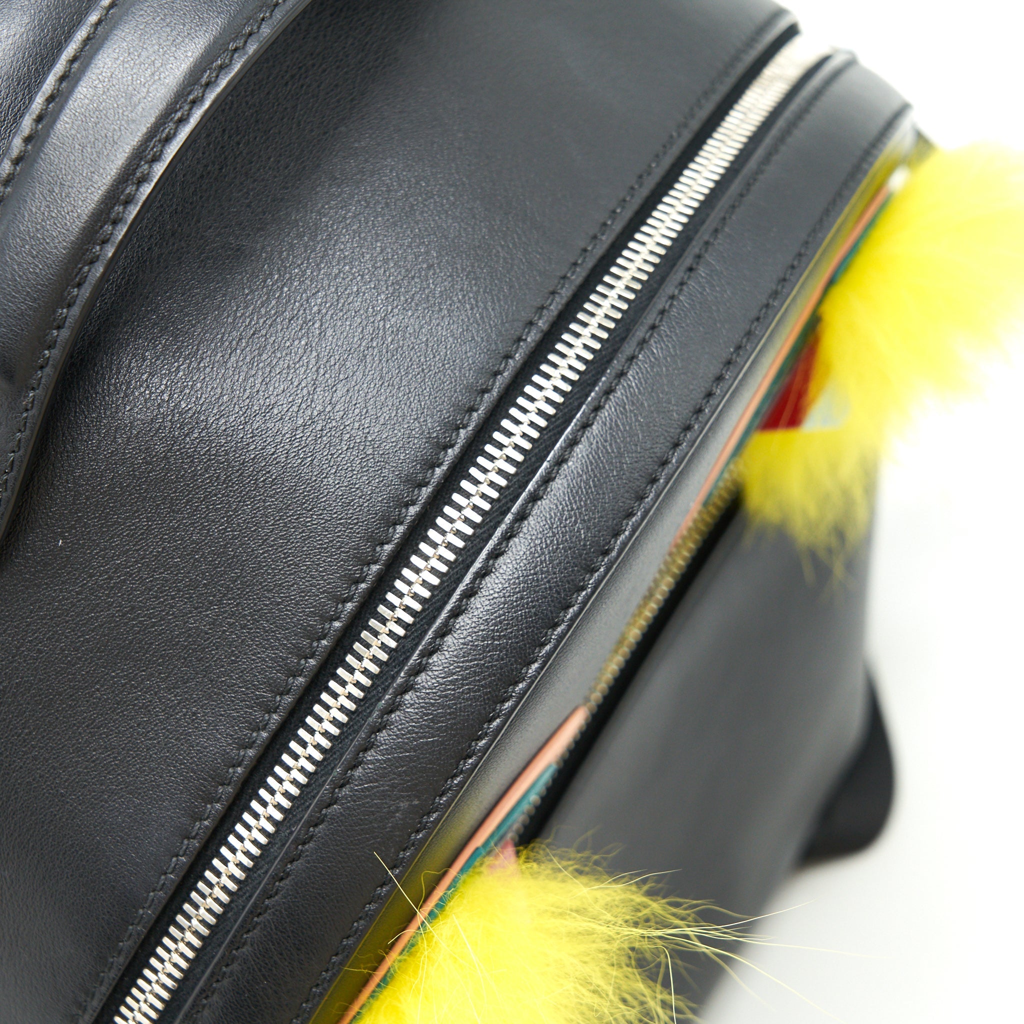 FENDI MONSTER BACKPACK IN BLACK WITH YELLOW FUR