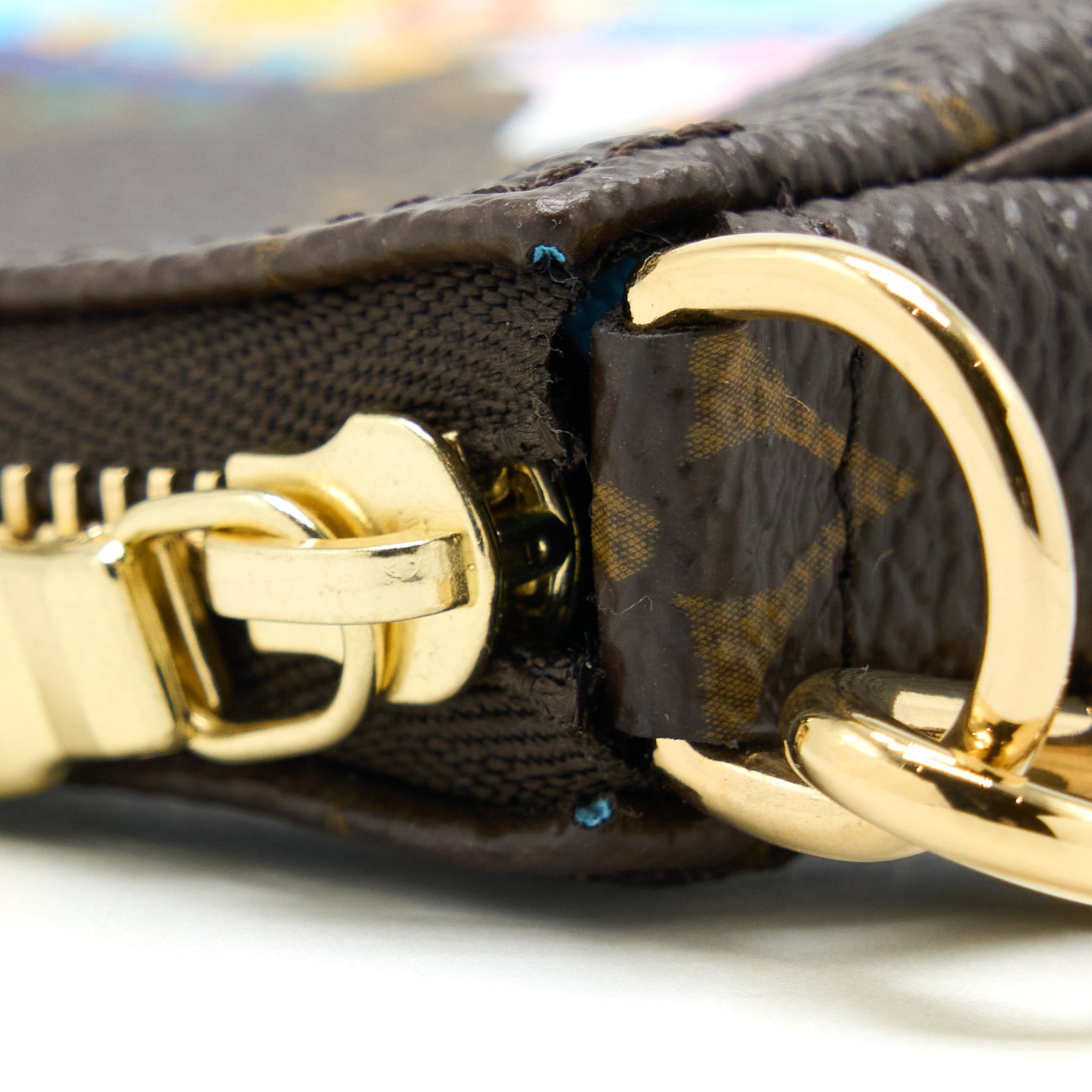 LOUIS VUITTON VIVIENNE HOLIDAYS MINI POCHETTE ACCESSORIES MONOGRAM CANVAS/MULTICOLOR GHW