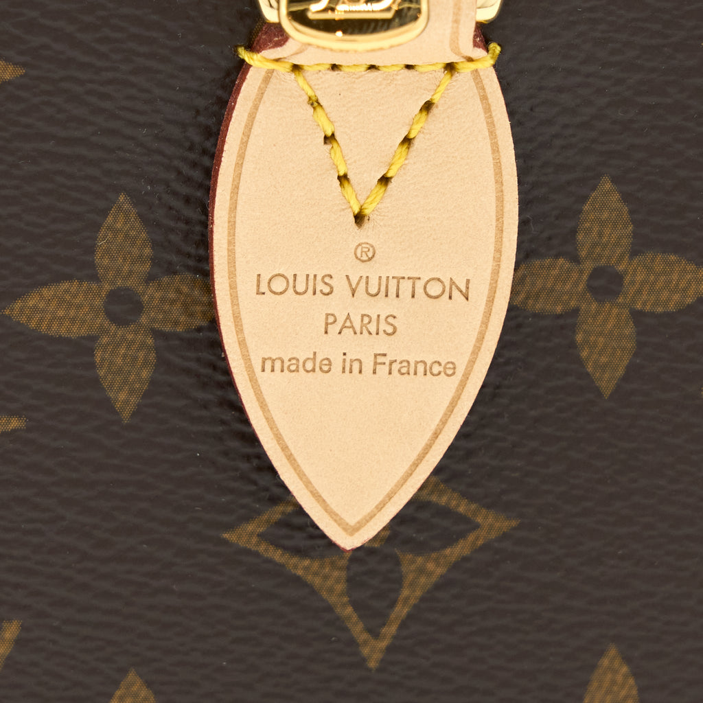 LOUIS VUITTON SPEEDY BANDOULIERE 20 MONOGRAM CANVAS WITH FUCHSIA STRAP GHW