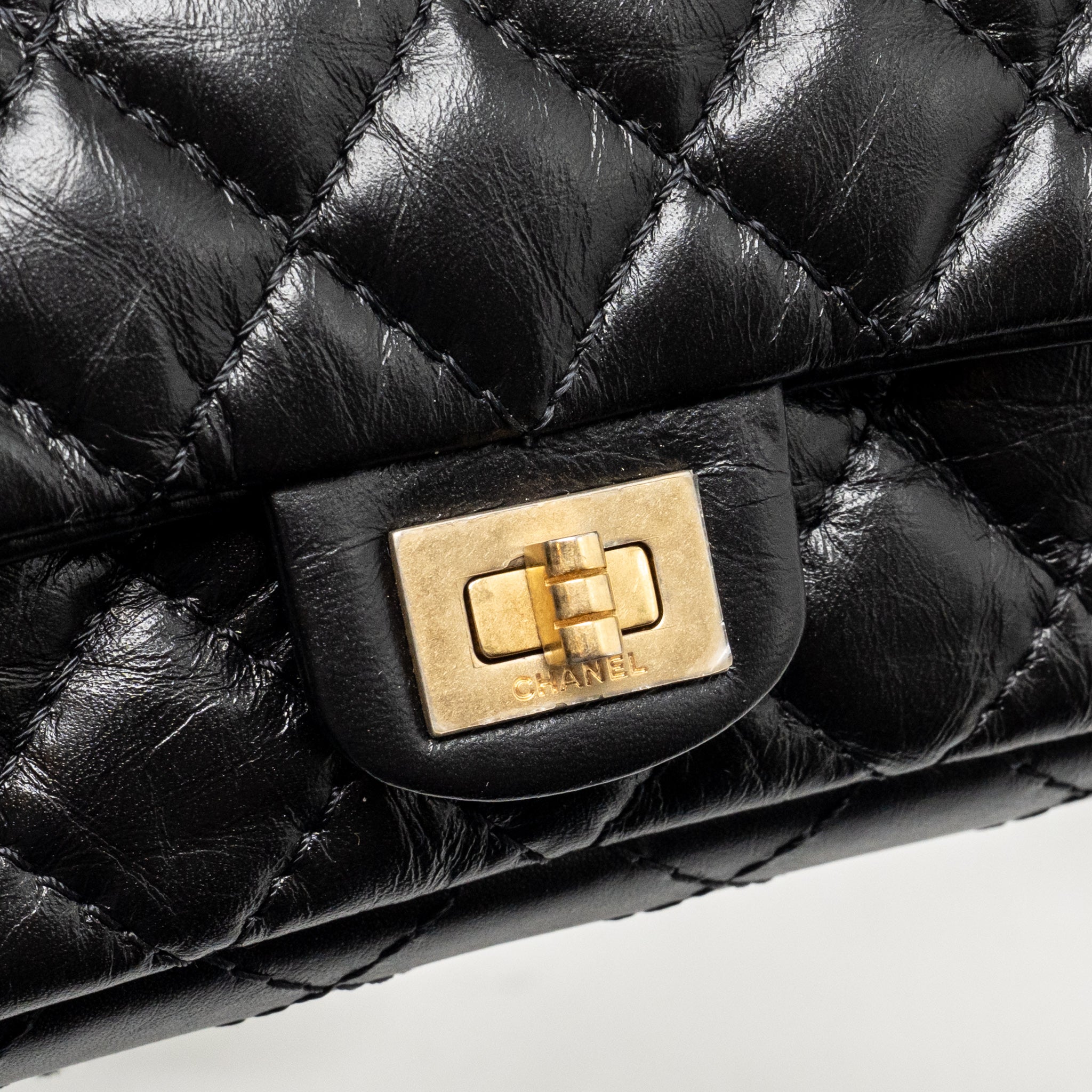CHANEL 2.55 REISSUE WAIST BAG AGED CALFSKIN BLACK GHW