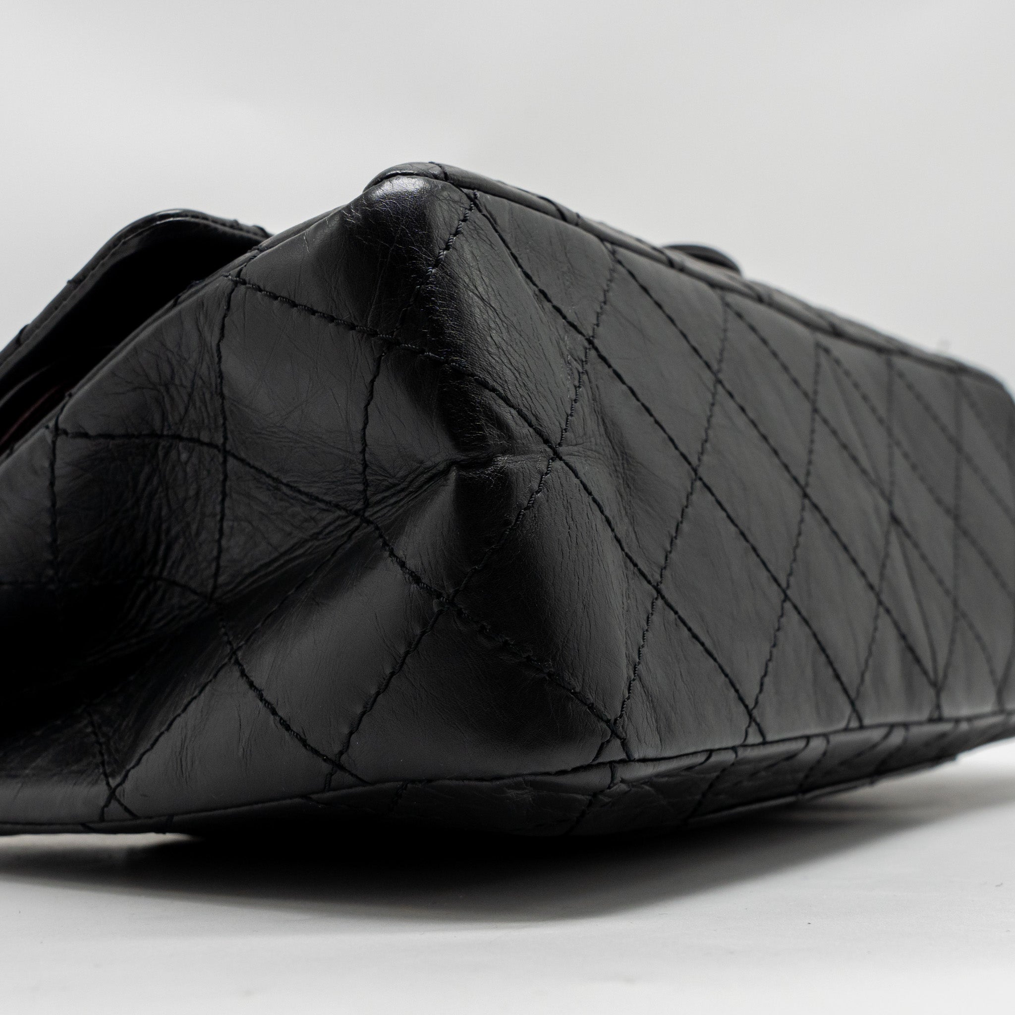 CHANEL MAXI 2.55 REISSUE DOUBLE FLAP BAG AGED CALFSKIN BLACK GHW