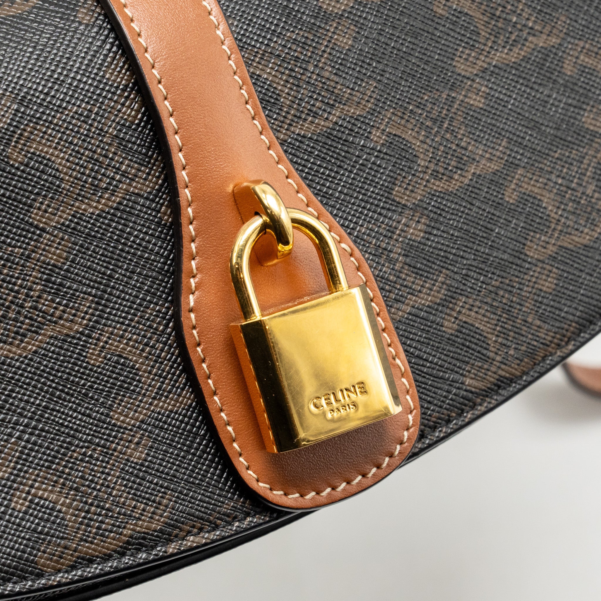 CELINE CLUTCH ON STRAP TABOU TRIOMPHE CANVAS/CALFSKIN TAN GHW