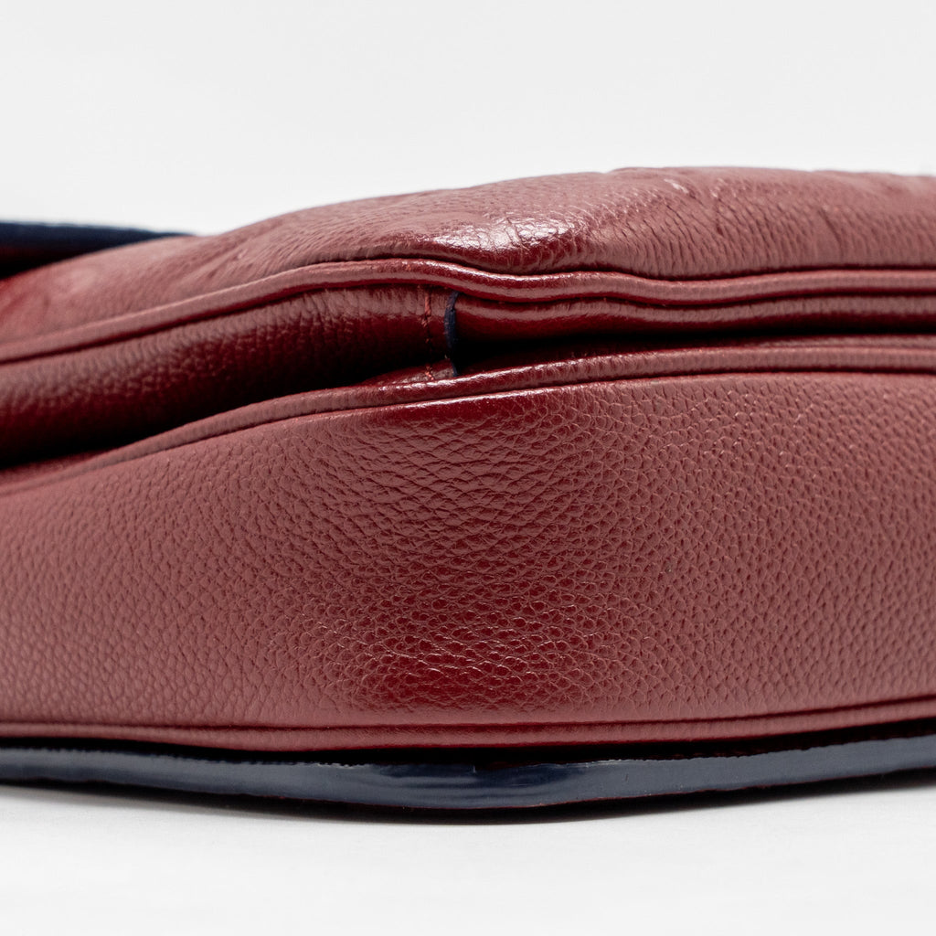 LOUIS VUITTON POCHETTE MÉTIS MONOGRAM EMPREINTE DARK RED GHW