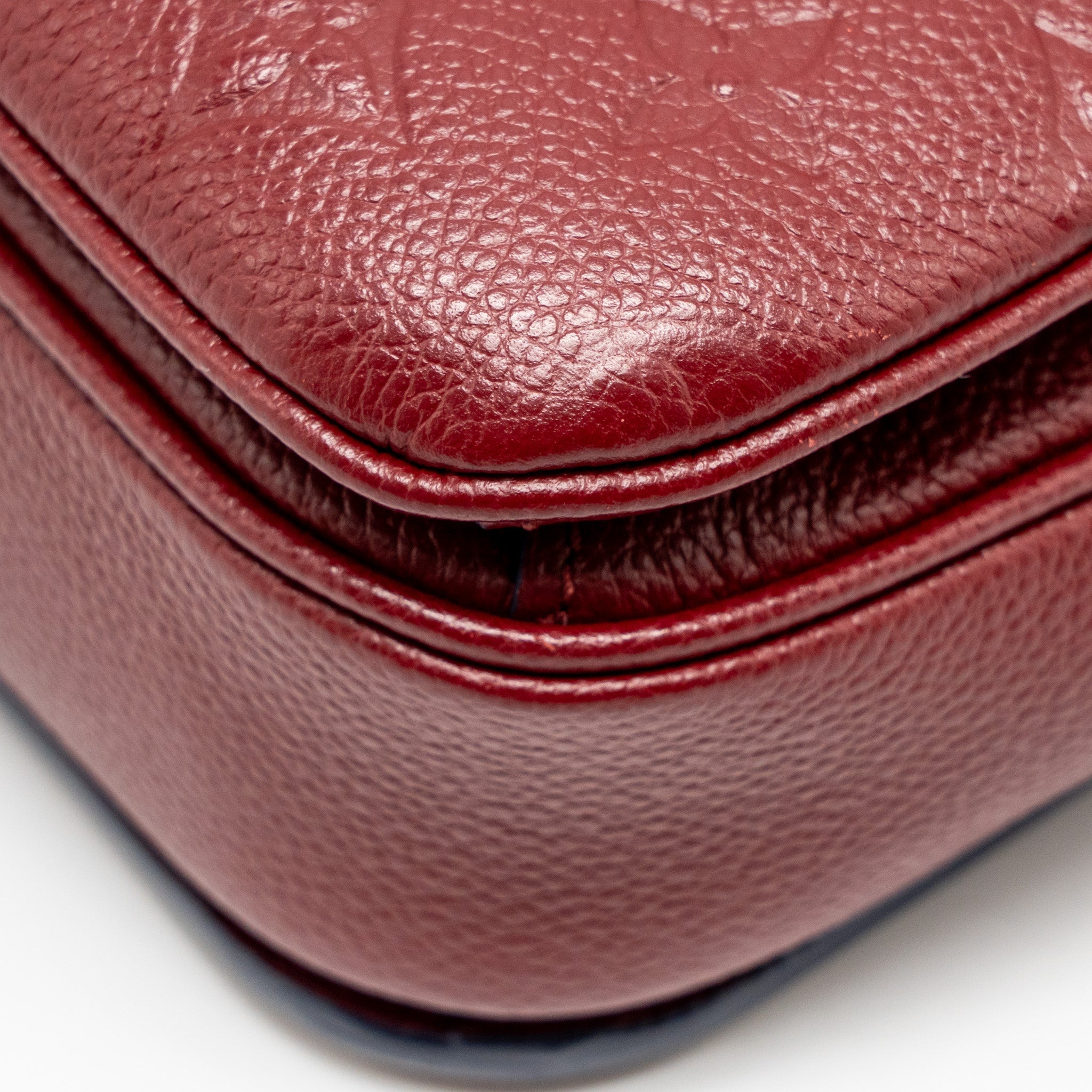 LOUIS VUITTON POCHETTE MÉTIS MONOGRAM EMPREINTE DARK RED GHW