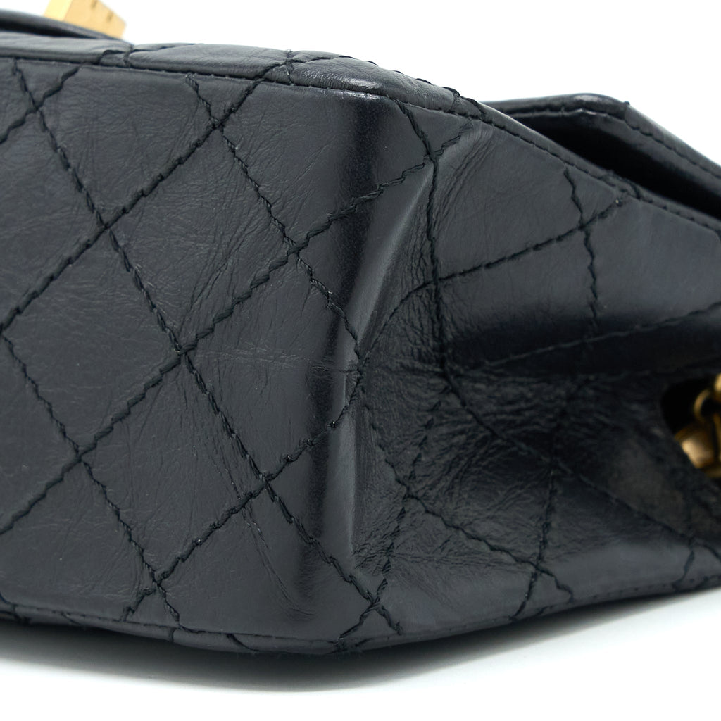 CHANEL MINI 2.55 REISSUE FLAP BAG AGED CALFSKIN BLACK BRUSHED GHW (MICROCHIP)