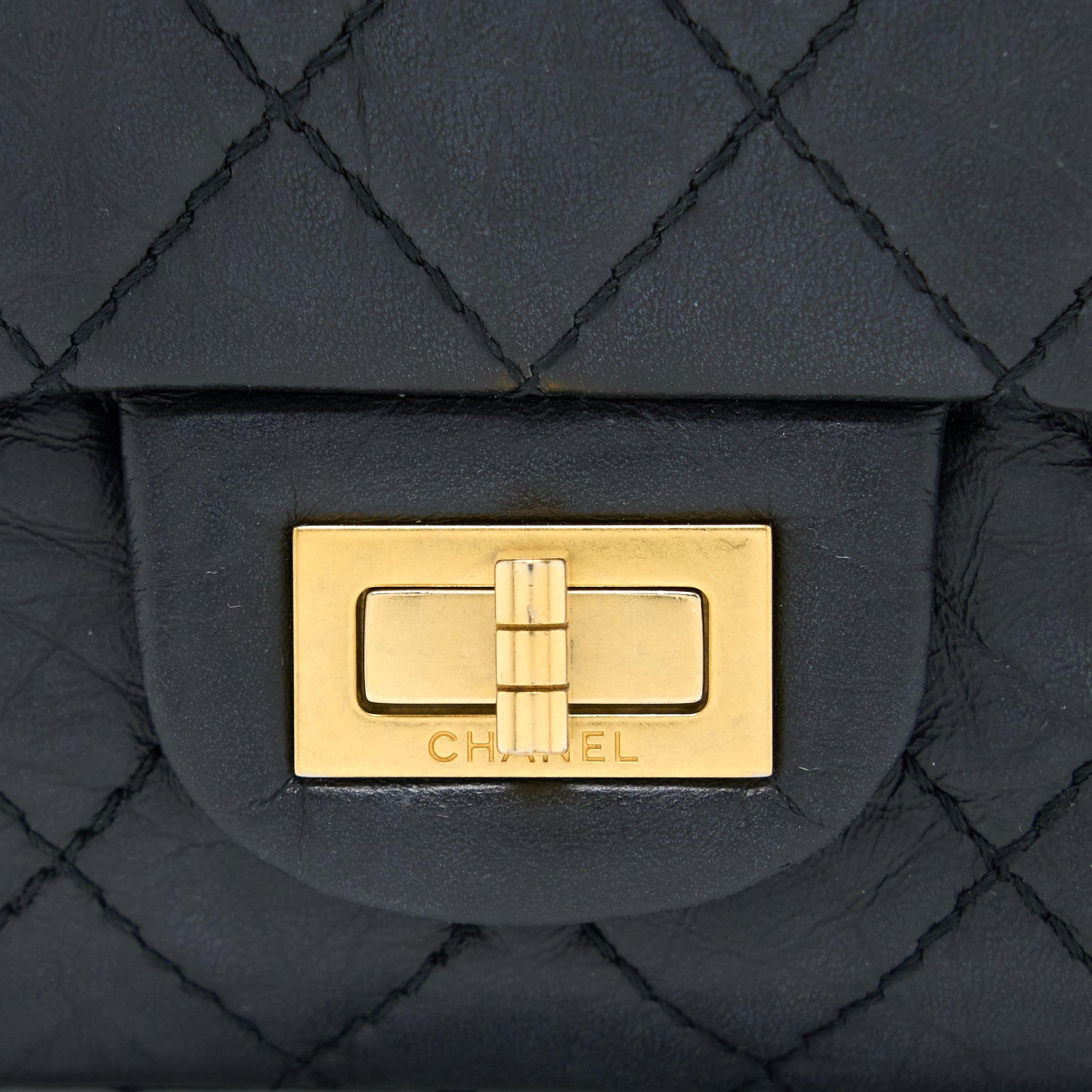 CHANEL MINI 2.55 REISSUE FLAP BAG AGED CALFSKIN BLACK BRUSHED GHW (MICROCHIP)