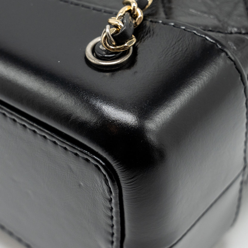 CHANEL SMALL GABRIELLE BACKPACK AGED CALFSKIN BLACK MULTICOLOUR COLOUR HARDWARE (MICROCHIP)