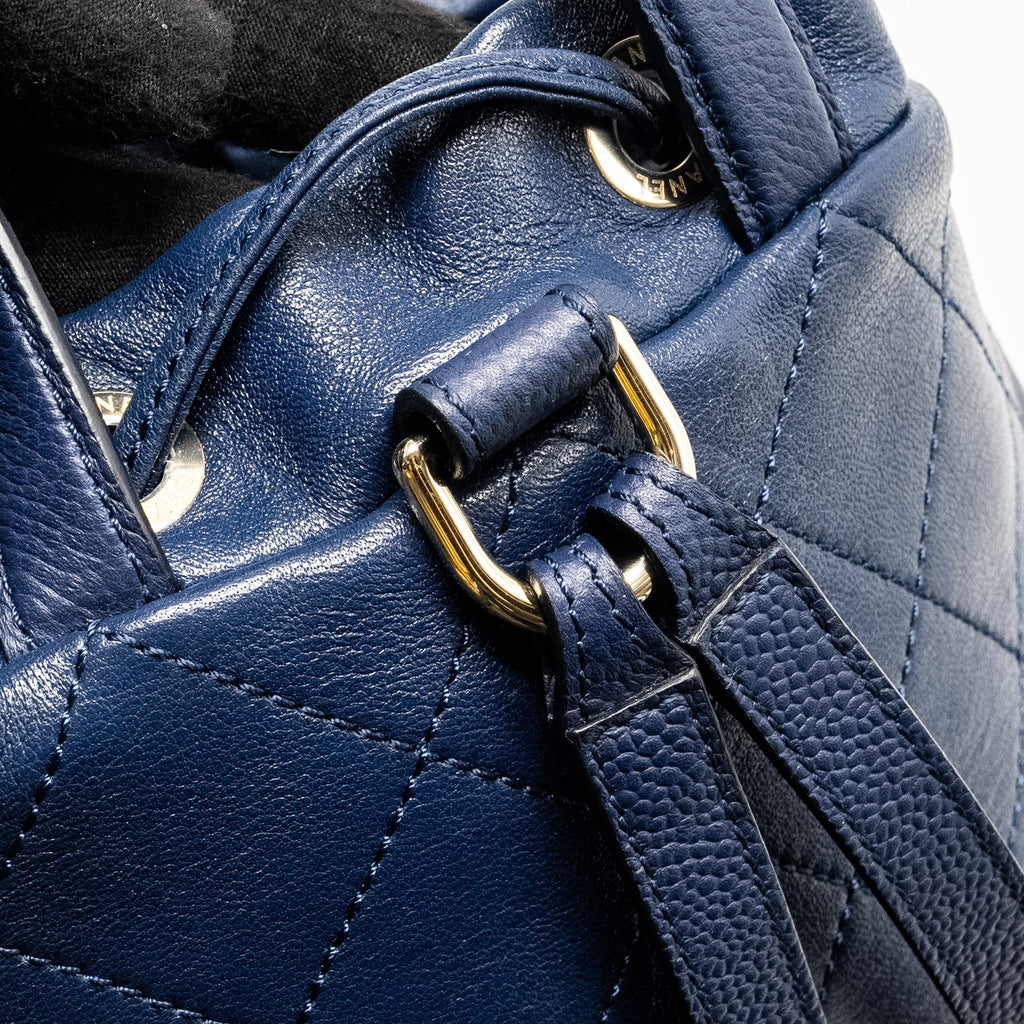 CHANEL DRAWSTRING BACKPACK LAMBSKIN/GRAINED CALFSKIN DARK BLUE LGHW