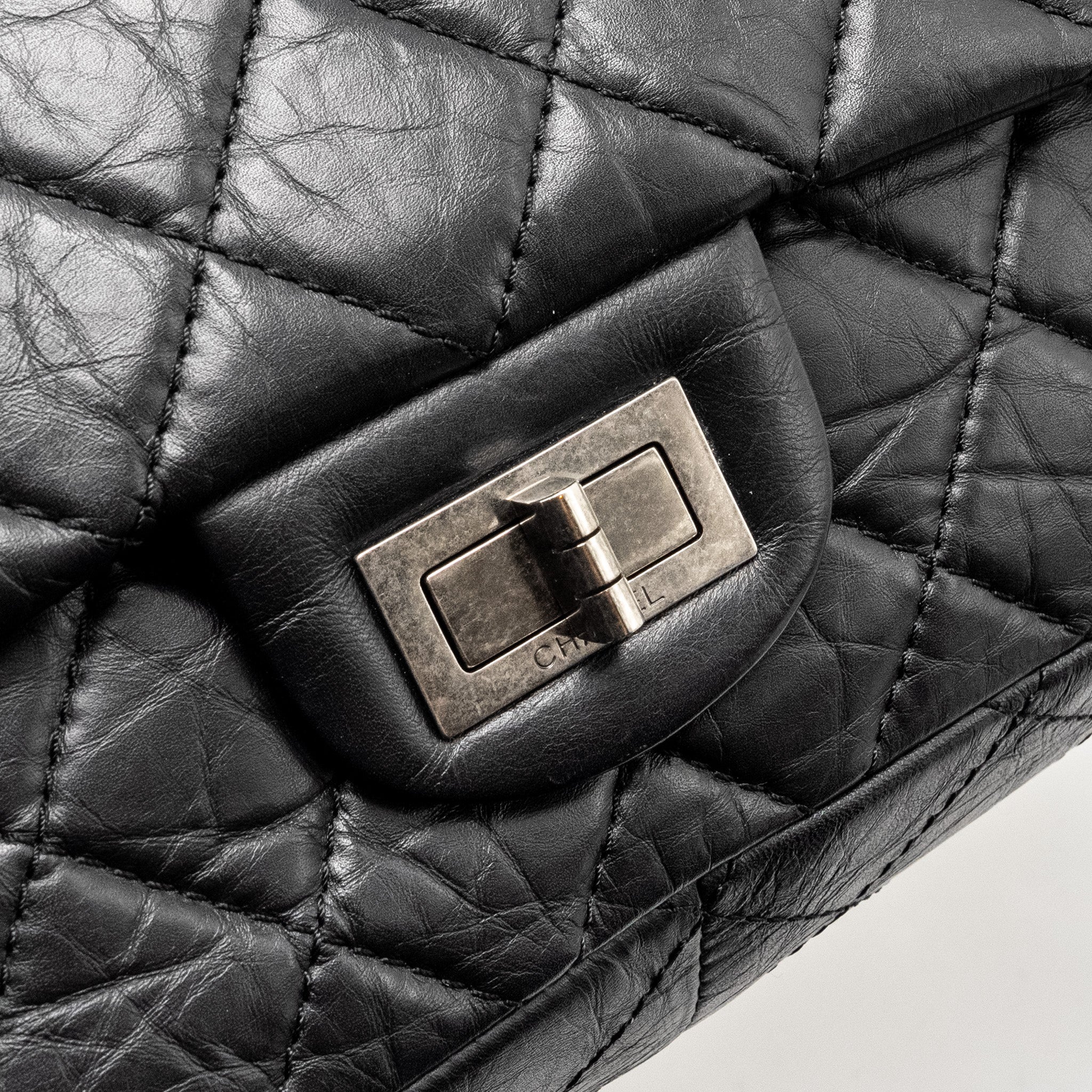 CHANEL 2.55 227 REISSUE FLAP BAG AGED CALFSKIN BLACK RUTHENIUM HARDWARE