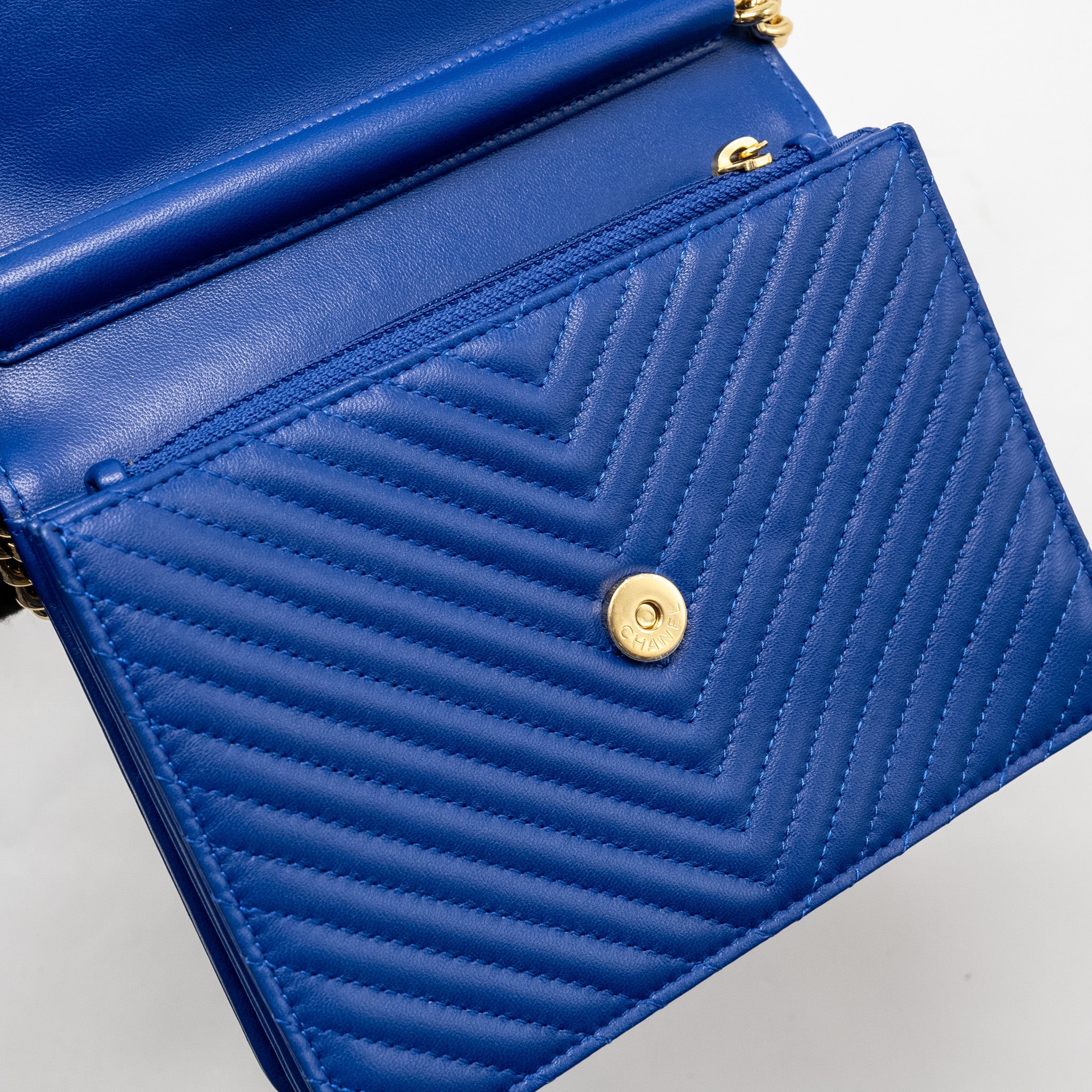 CHANEL BOY CLUTCH WITH CHAIN  CHERVON LAMBSKIN BLUE GHW