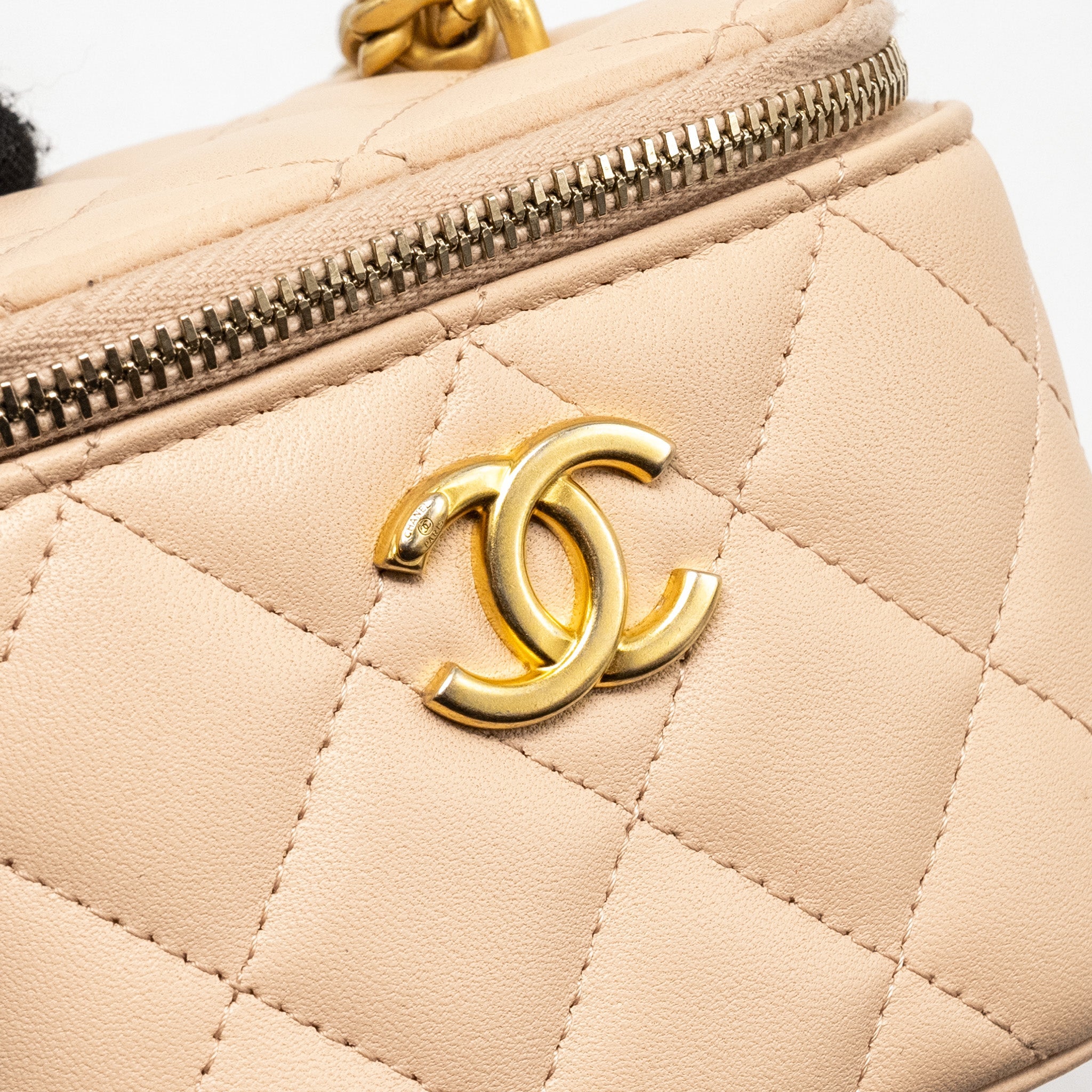 CHANEL MINI VANITY CASE WITH CAMELLIA ADJUSTABLE CHAIN LAMBSKIN BEIGE GHW (MICROCHIP)